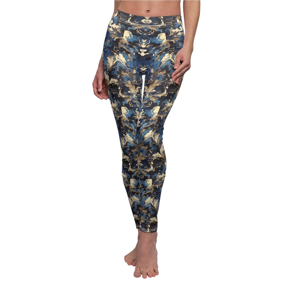 A pair of blue and gold floral print leggings with a skinny fit, elastic waistband, and a high-waisted design.