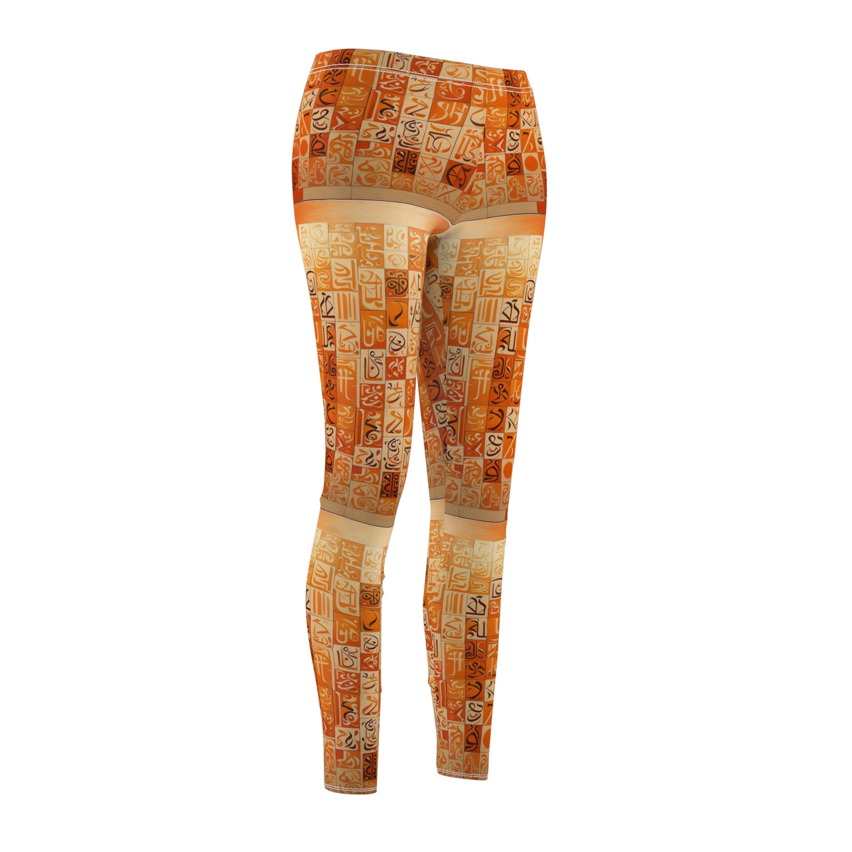 A pair of skinny fit leggings with geometric patterns in orange, creams, and browns with black and cream calligraphy, front side view.